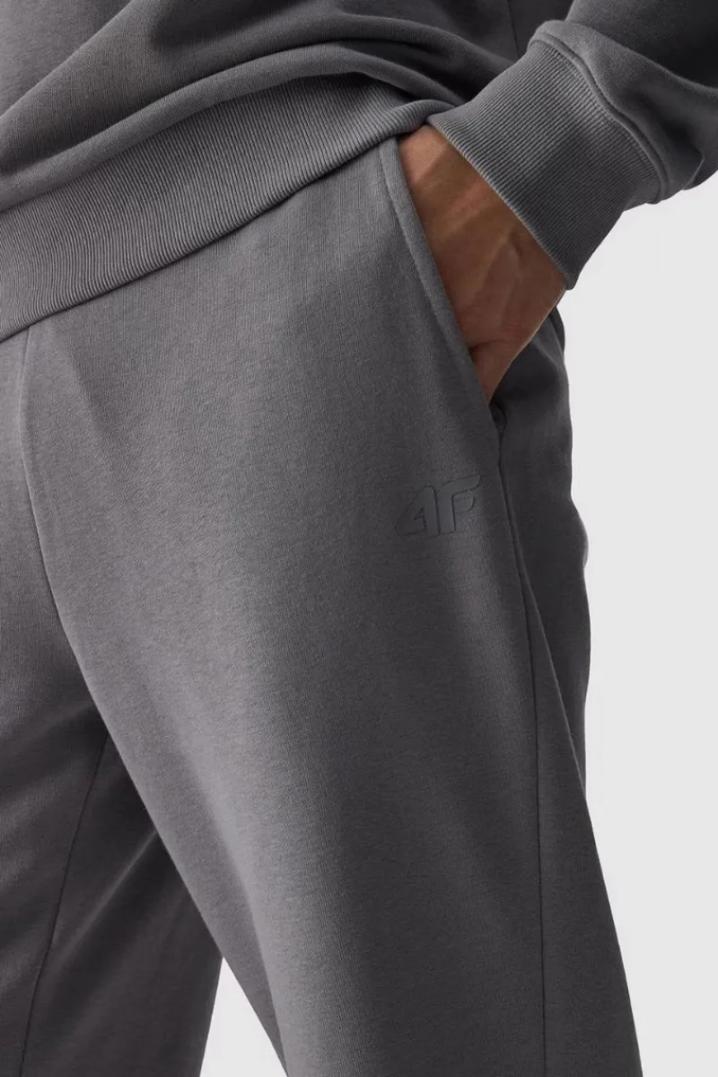 Online Męskie Spodnie Dresowe Joggery WMM00TTROM0942-25S Szare Męskie Spodnie Męskie|Odzież 4F